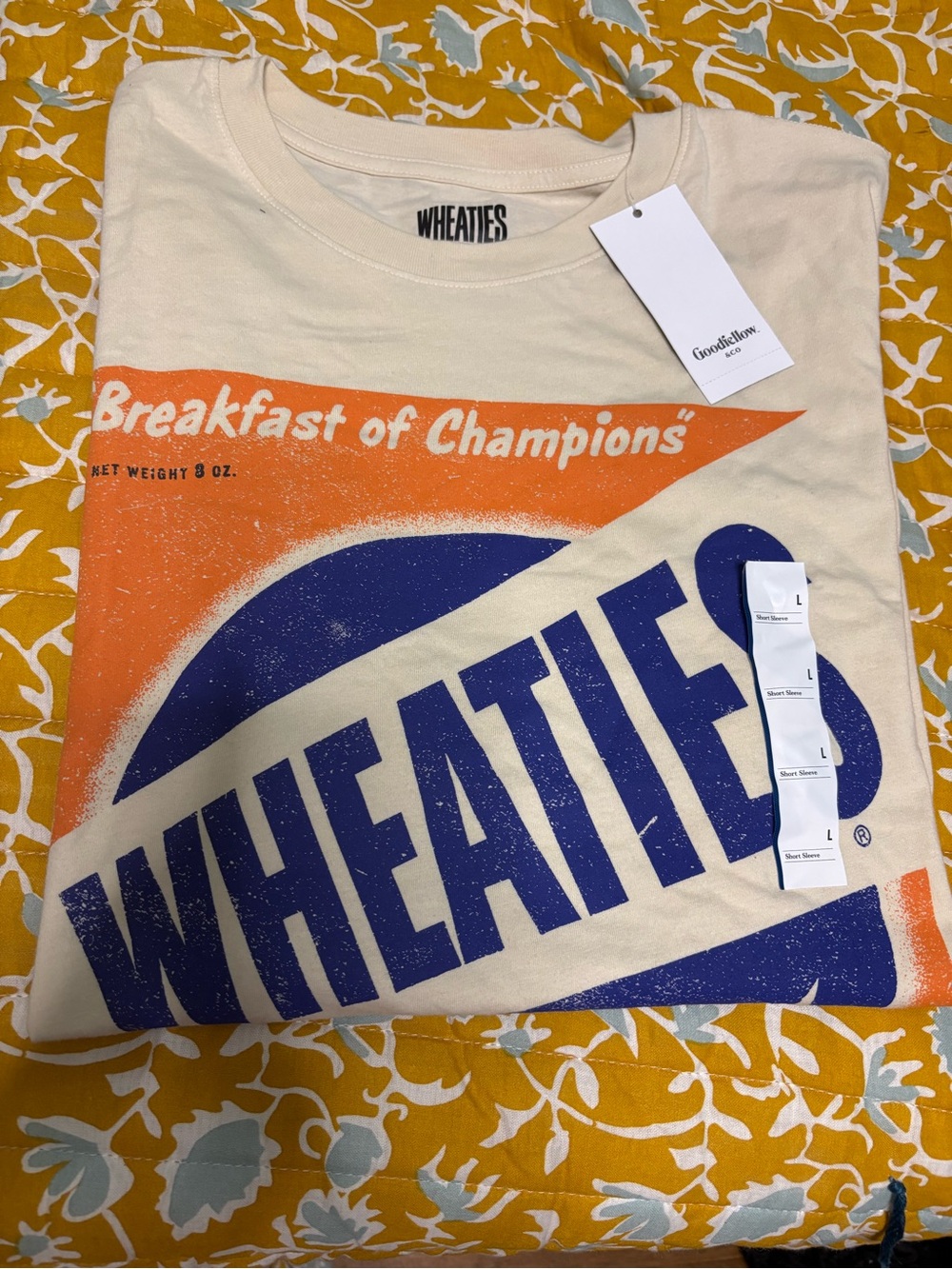 Goodfellow & Co Cream Tee with Orange and Blue Wheaties Graphic